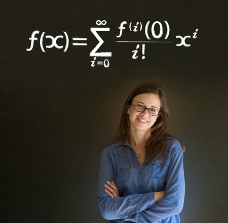 Learn Math or Maths confident beautiful woman teacher chalk blackboard backgroundの写真素材