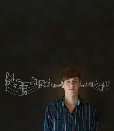 Learn music business man, student or teacher chalk blackboard backgroundの写真素材