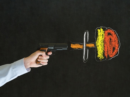 Business man, student, teacher or politician shooting gun chalk nuclear bomb cloud on blackboard backgroundの写真素材