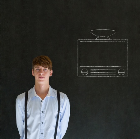 Businessman, teacher or student with with chalk tv television on blackboard backgroundの写真素材