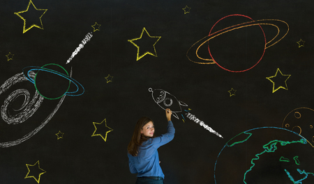 Businessman, student or teacher with chalk space travel blackboard backgroundの写真素材