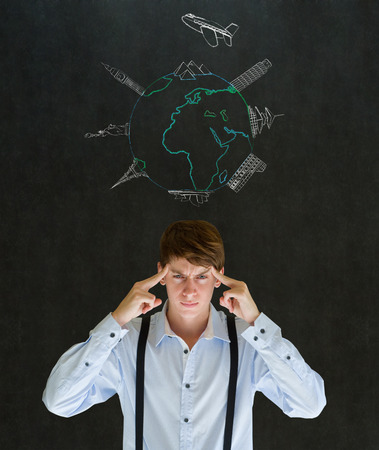 Business travel agent chalk airplane world globe with famous landmarks on blackboard background