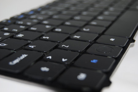 Laptop computer keyboard disassembled in black