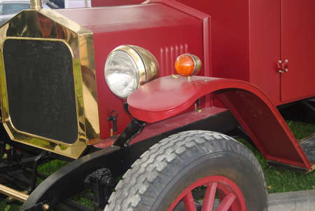 Front of vintage, classic car with wooden rimsの写真素材