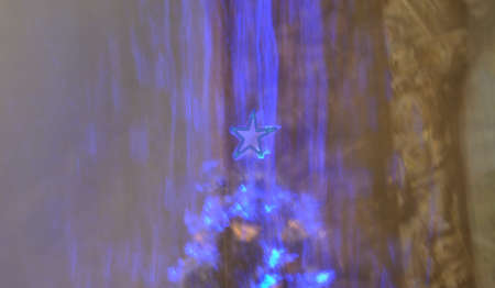 Lights motion with Christmas tree top with lit star