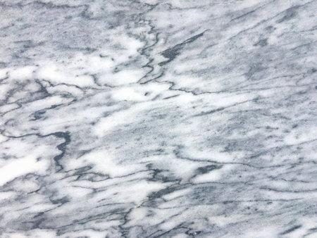 Polished marble surface texture with lines, white, gray and blackの写真素材