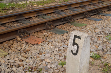 Railway track number 5, number five on the road sign.