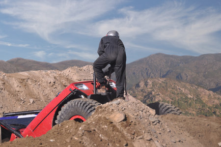 Carcross driver on a race in the mountains. Extreme sport.の写真素材
