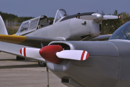 Aircraft on the airfield, closeup of the wing and engineの写真素材