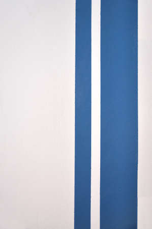 blue lines on white wallの写真素材