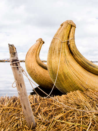 Reed boats in the Reed Islands on Lake Titicaca in Peru.の写真素材
