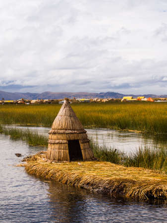 Primitive reed hut on Lake Titicaca in the Reed Islands of Peruの写真素材