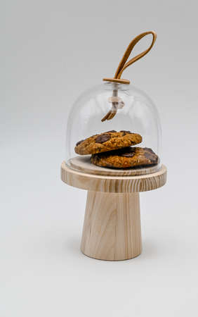 Cookies Stand, wooden stand with glass lid, wooden stand with lid, cookies stand isolated on white back ground, with full depth of fieldの写真素材