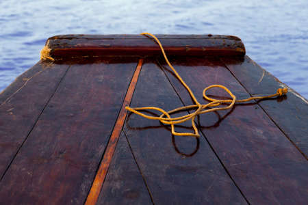 Cambodia rural wooden boat bow close-upの写真素材