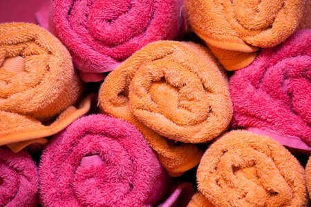 Two color towels rolled in stackの写真素材