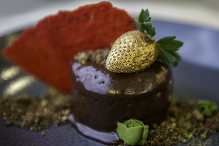 golden strawberry chocolate cakeの写真素材
