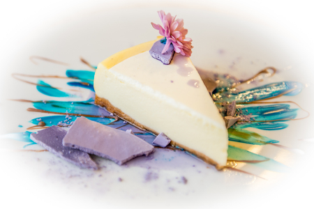Colorful cheesecake blue pink green and pink flowerの写真素材