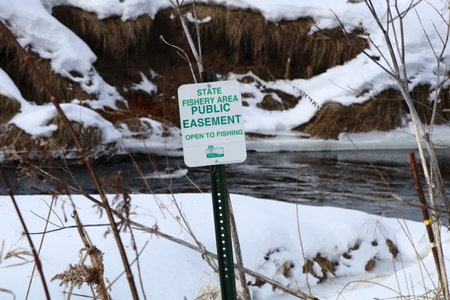 New Haven, WI / USA  - January 12 / 2020: Easement sign to notify public fishing is allowedのeditorial素材