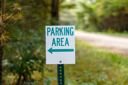 Sign indicating parking area in a rural woodland areaの写真素材