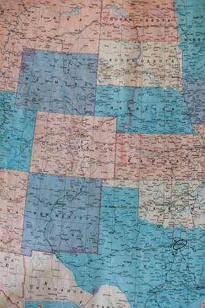 Old vintage map of the Plain States mounted on a wall. Selective focus, background blur and foreground blurの写真素材