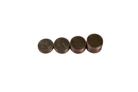 Overhead view of 4 stacks of US quarters, isolated on white background