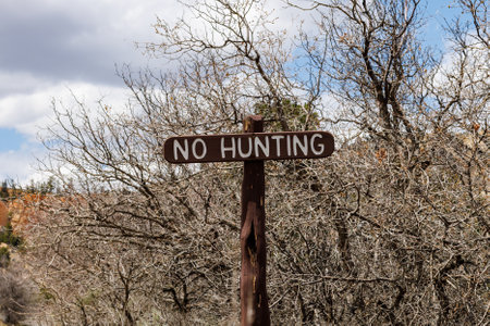 Wooden No Hunting sign in Bryce Canyon National Park.の写真素材