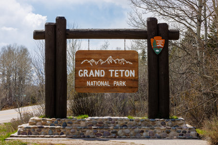 Moran, Wyoming, USA  - May 16 2023: Entrance sign into Grand Teton National Park near the town of Moran in western Wyomingのeditorial素材