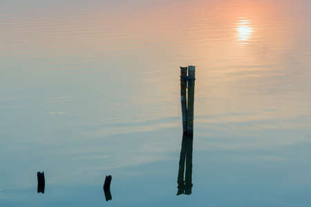 lake under setting sunの写真素材