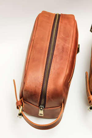 Side pouch bag detail made of leather. Brownの写真素材