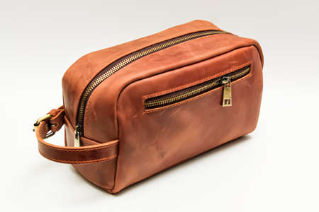 Side pouch bag detail made of leather. Brownの写真素材