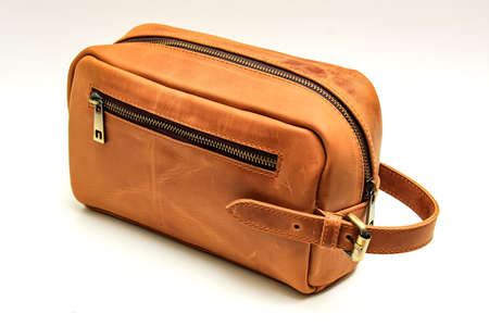 Side pouch bag detail made of leather. Brownの写真素材
