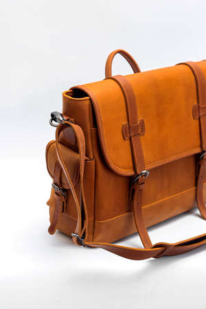 Classic brown leather bag with white background isolation. Men's Leather Bag.の写真素材