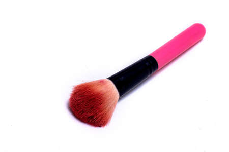Makeup brush on a white background. Festive magic makeup concept. Templates for design.の写真素材