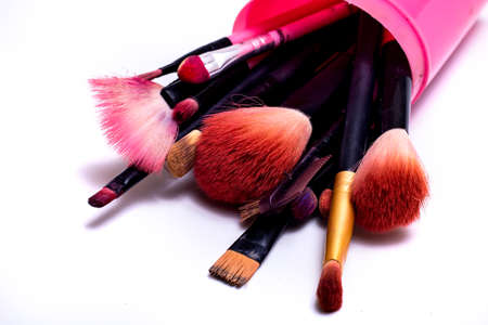 Makeup brush on a white background. Festive magic makeup concept. Templates for design.の写真素材