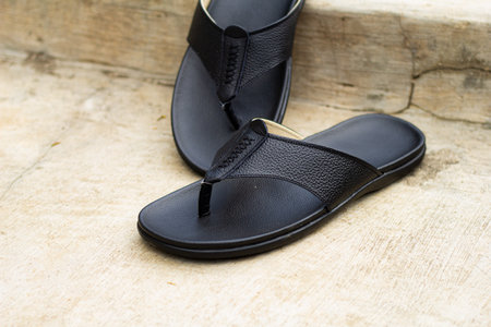 Black cowhide sandals, leather sandals for men.の写真素材