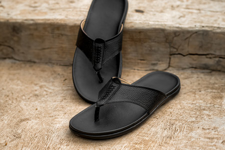 Black cowhide sandals, leather sandals for men.の写真素材