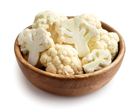 Cauliflower in wooden bowl isolated on white backgroundの写真素材