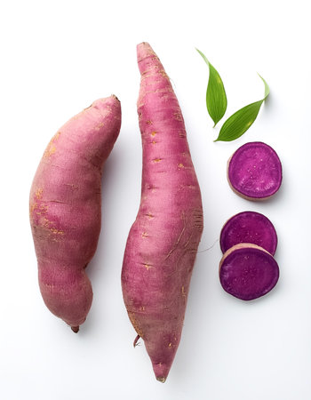 purple sweet yam whole and slice isolated on white backgroundの写真素材