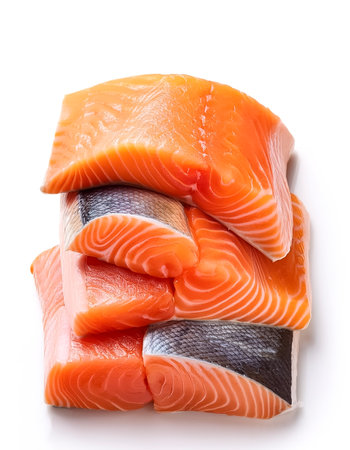 Stack of salmon fish isolated on white backgroundの写真素材