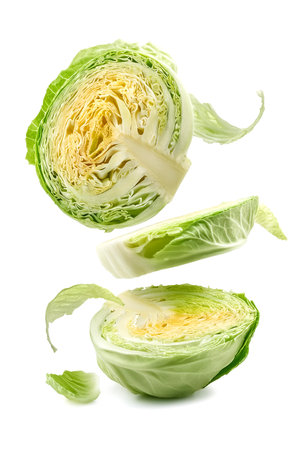 Falling cabbage slice isolated on white background, clipping path, full depth of fieldの写真素材