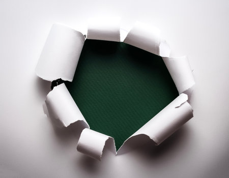 a white paper hole tornの写真素材