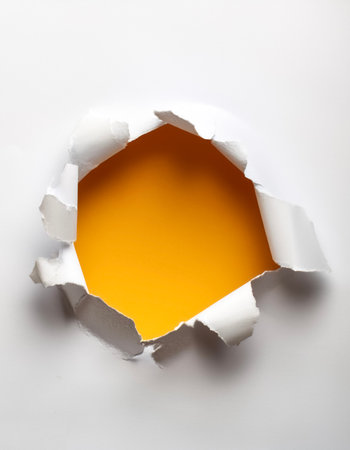 a white paper hole tornの写真素材