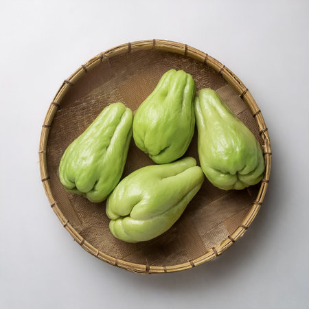A Fresh Chayote on a white backgroundの写真素材