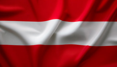 Austria flag waving in the wind. Close up of Austria banner blowing, soft and smooth silk. Cloth fabric texture ensign background. Use it for national day and country occasions conceptの写真素材