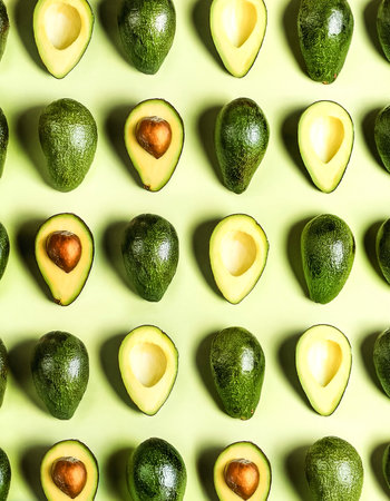 Fresh sweet Avocado slices pattern backgrond, close upの写真素材