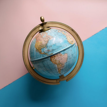 Ancient globe, isolated on a Soft blue and Pink Pastelの写真素材