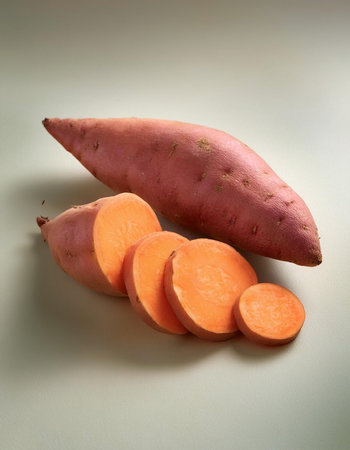 Sweet potato vegetables, isolated on a pastelの写真素材