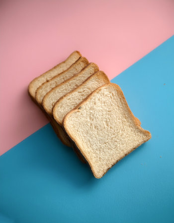 bread slices, isolated on a soft blue and Pink Pastelの写真素材