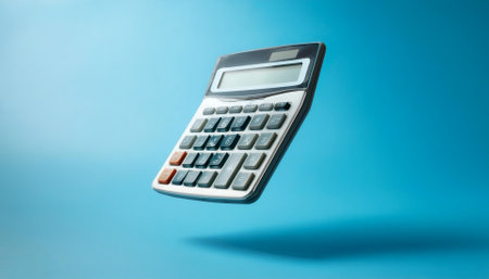 Calculator floating or flying isolated on light blue background