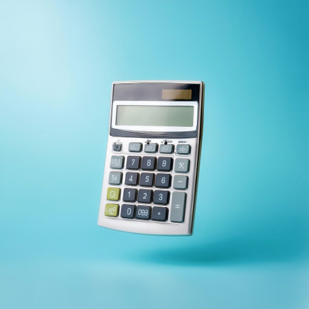 Calculator floating or flying isolated on light blue backgroundの写真素材